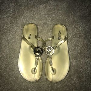 Michael Kor’s gold t-strap sandals